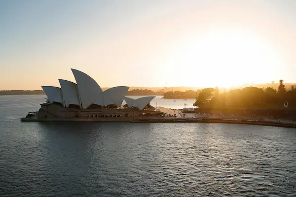 Sydney Opera House at sunrise over Sydney Harbour, Australia